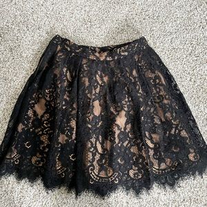 Michael Kors lace black skirt. Size 2. In great condition no stains or rips.